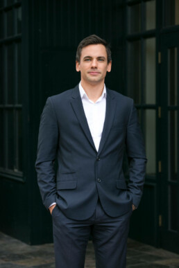 On Location Natural Light Corporate Headshot on Grey Background by Vancouver Photographer Rob Trendiak